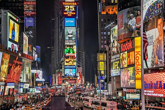 Time Square's multitude of neon billboards, focusing on desires 