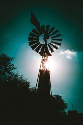 Silhouette of a farm windmill