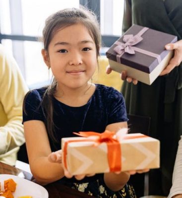 Girl giving a present