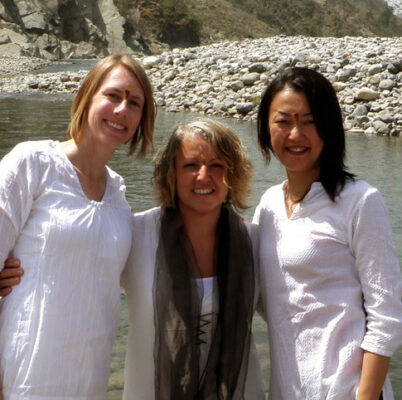 The author with two other female yoga students at the Yamuna River in India