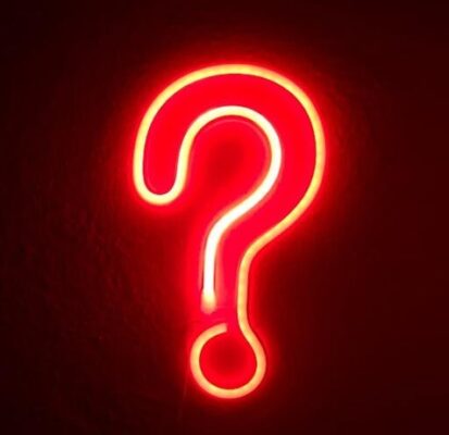 Red neon question mark sign