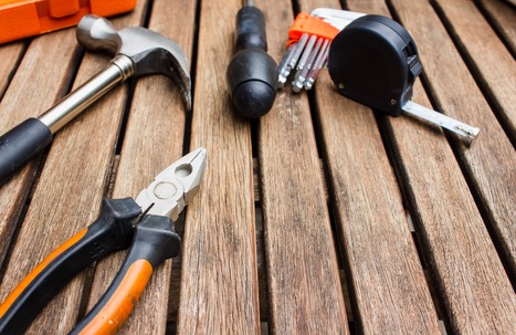 tools laying on a wooden table