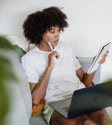 woman taking time to journal and reflect about her purpose