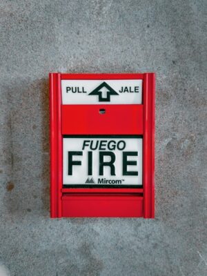 red and white emergency fire alarm