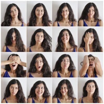 16 different emotional reactions of a young woman's face, each one taking energy to create