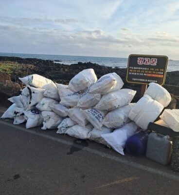 pile of full beach clean up bags to be disposed of like the limiting patterns in our minds waiting to be let go
