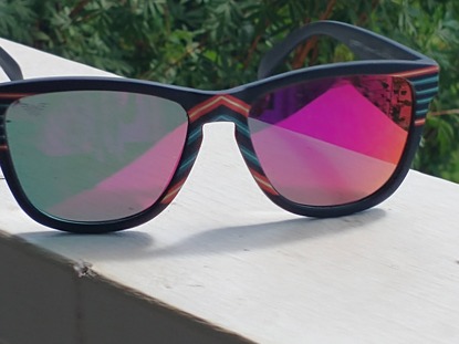 looking through sunglasses that changes the view of the world