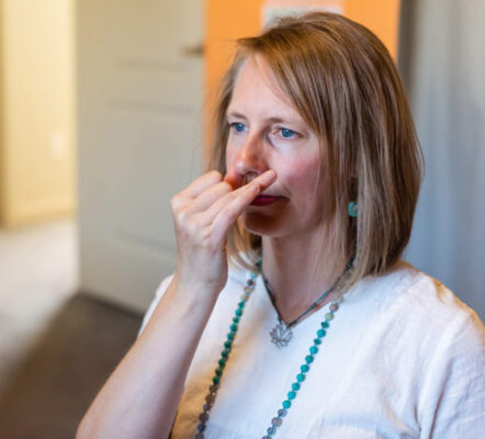 Author practicing alternate nostril breathing to balance the mind