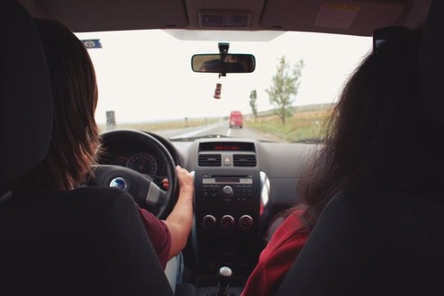 looking out the front window of a car which is a common daily action